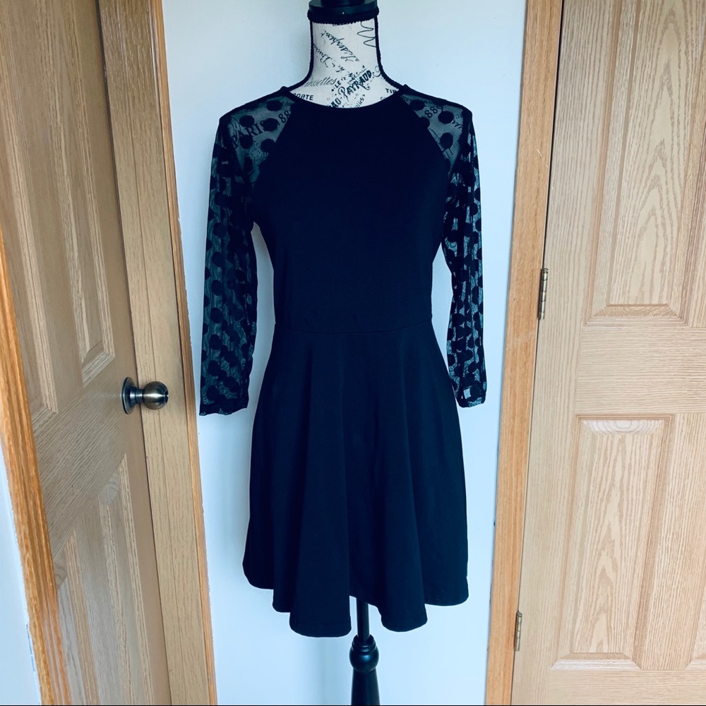 Express Black Dress with Fun Polka Dot Arms